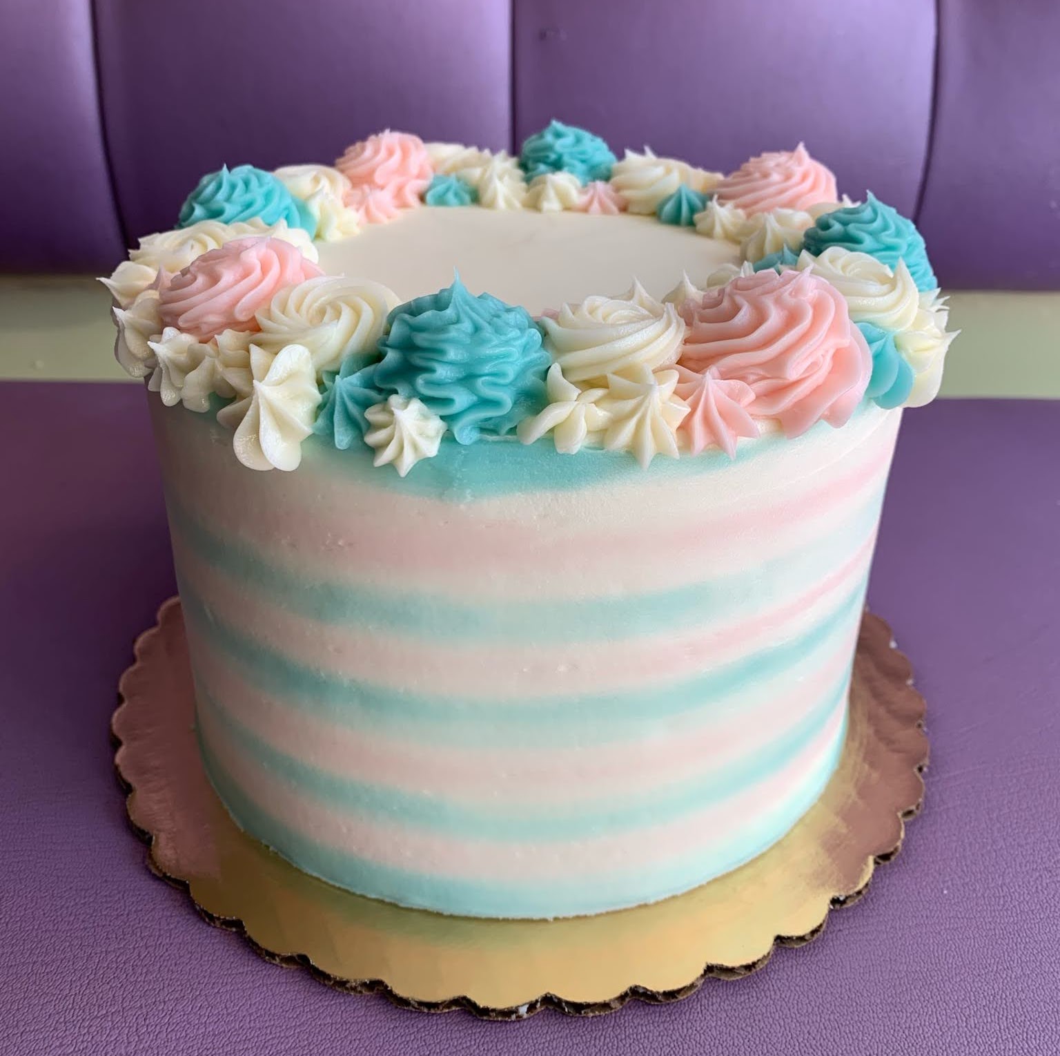PINK AND BLUE WATERCOLOR AND ROSETTE BABY SHOWER GENDER REVEAL CAKE IN CHICAGO ILLINOIS