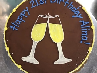 CELEBRATION CHAMPAGNE PROSECCO BUBBLY GLASSES CHEERS TOAST ENGAGEMENT GRADUATION 21ST BIRTHDAY CAKE IN CHICAGO ILLINOIS