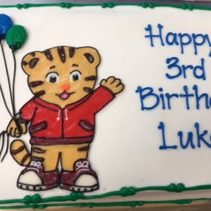 PBS DANIEL TIGER KIDS CARTOON WITH BALLOONS FOR KIDS CUSTOM CHARACTER BIRTHDAY PARTY CAKE IN CHICAGO