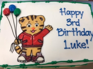 PBS DANIEL TIGER KIDS CARTOON WITH BALLOONS FOR KIDS CUSTOM CHARACTER BIRTHDAY PARTY CAKE IN CHICAGO