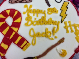 HARRY POTTER GRYFFINDOR RED AND GOLD QUIDDITCH WIZARD HOGWARTS THEME KIDS MOVIE CHARCTER CUSTOM BIRTHDAY CAKE IN CHICAGO