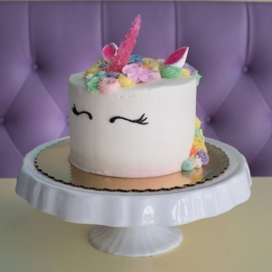 CUTE UNICORN FACE WITH PASTEL FLOWERS AND ROSETTES FOR GIRLS BIRTHDAY PARTY BABY SHOWER CAKE IN CHICAGO