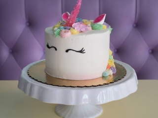 CUTE UNICORN FACE WITH PASTEL FLOWERS AND ROSETTES FOR GIRLS BIRTHDAY PARTY BABY SHOWER CAKE IN CHICAGO