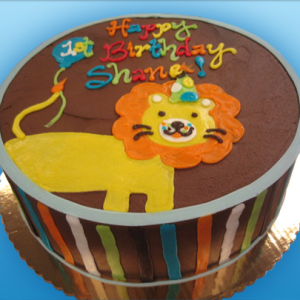 CUTE CARTOON CIRCUS LION WITH BALLOON AND COLORFUL STRIPED ZOO ANIMAL THEME KIDS BIRTHDAY CELELBRATION PARTY CUSTOM CAKE IN CHICAGO