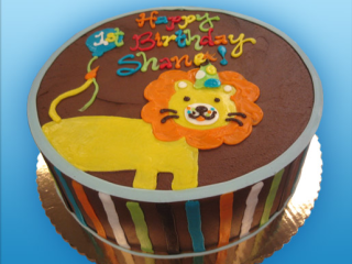 CUTE CARTOON CIRCUS LION WITH BALLOON AND COLORFUL STRIPED ZOO ANIMAL THEME KIDS BIRTHDAY CELELBRATION PARTY CUSTOM CAKE IN CHICAGO