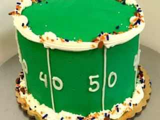 FULL FOOTBALL 50 YARD LINE SIDE DECORATED BOYS' DAD SPORTS BIRTHDAY SUPERBOWL GAME DAY CAKE IN CHICAGO ILLINOIS